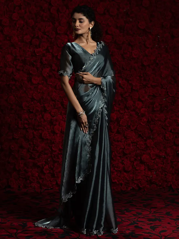 Dark grey chiffon saree with cutdana work