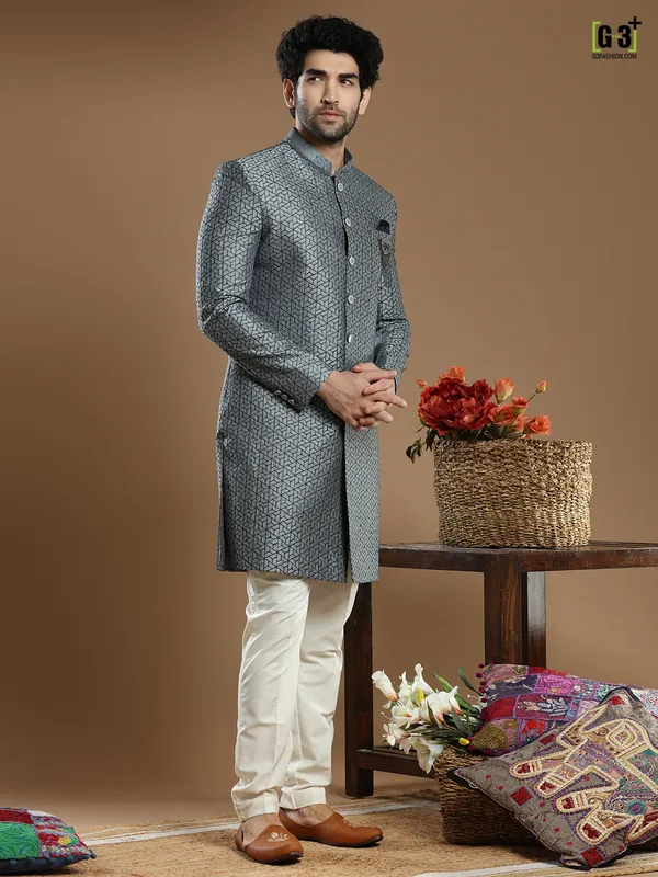 Dark grey hued silk wedding and party wear indo western for men