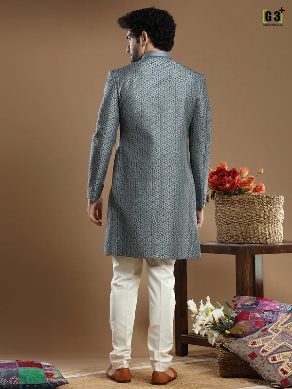 Dark grey hued silk wedding and party wear indo western for men