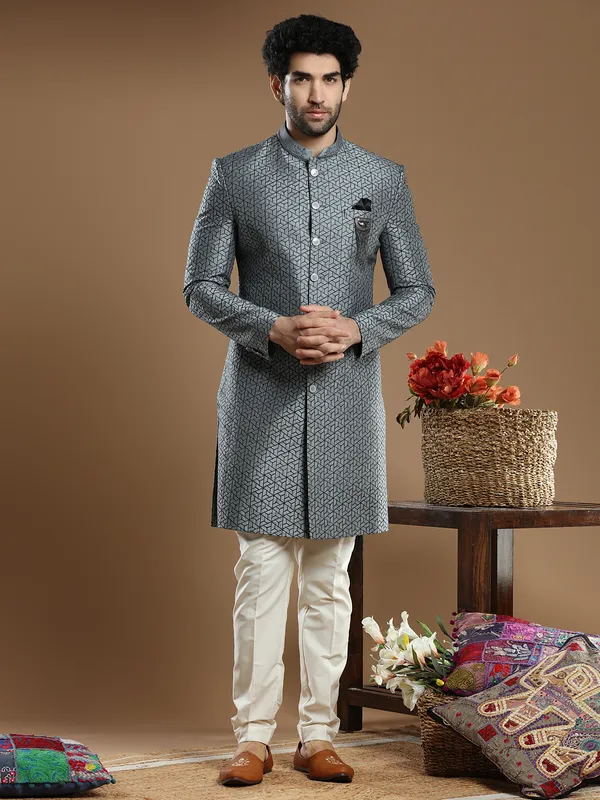 Dark grey hued silk wedding and party wear indo western for men