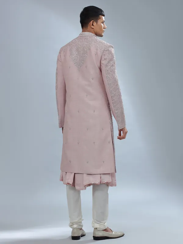 Dark peach peshwai style sherwani for groom