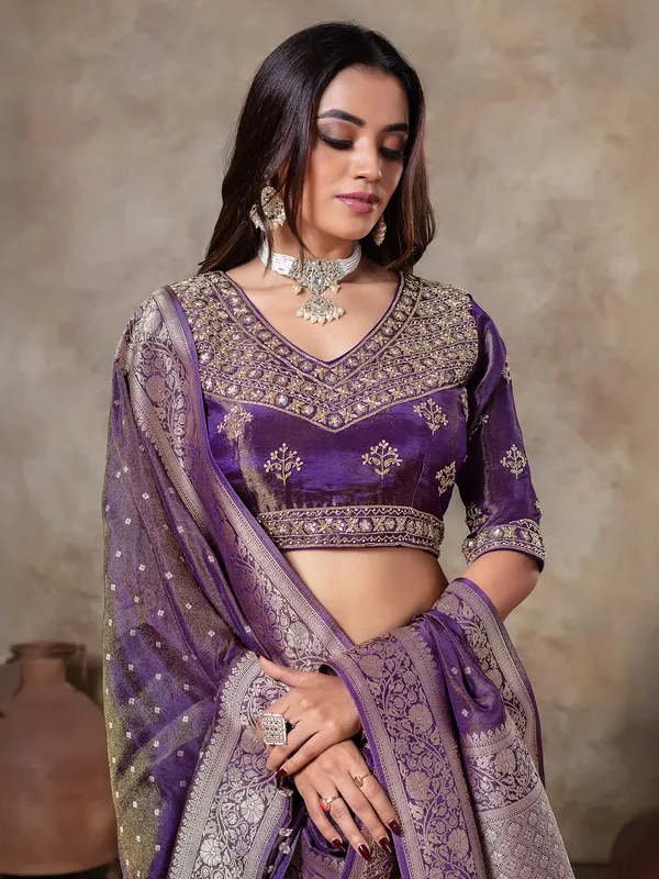 Dark purple tissue silk zari weaving saree