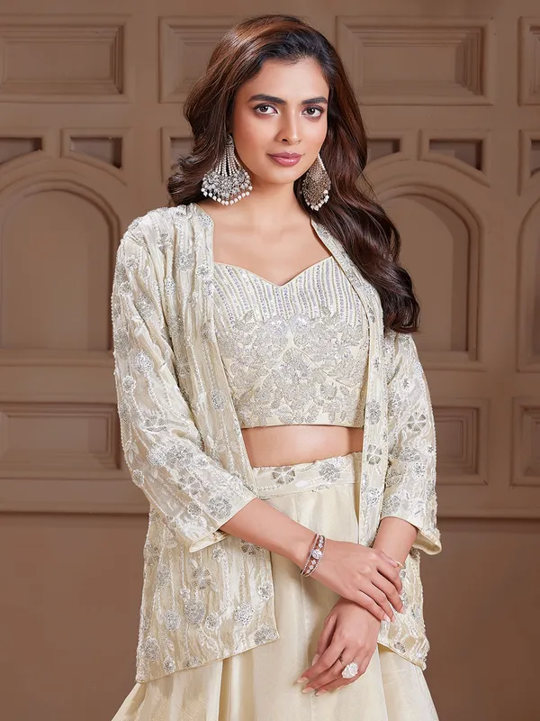 Dazzling cream silk jacket style lehenga choli
