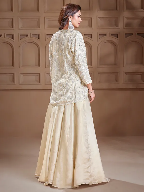 Dazzling cream silk jacket style lehenga choli