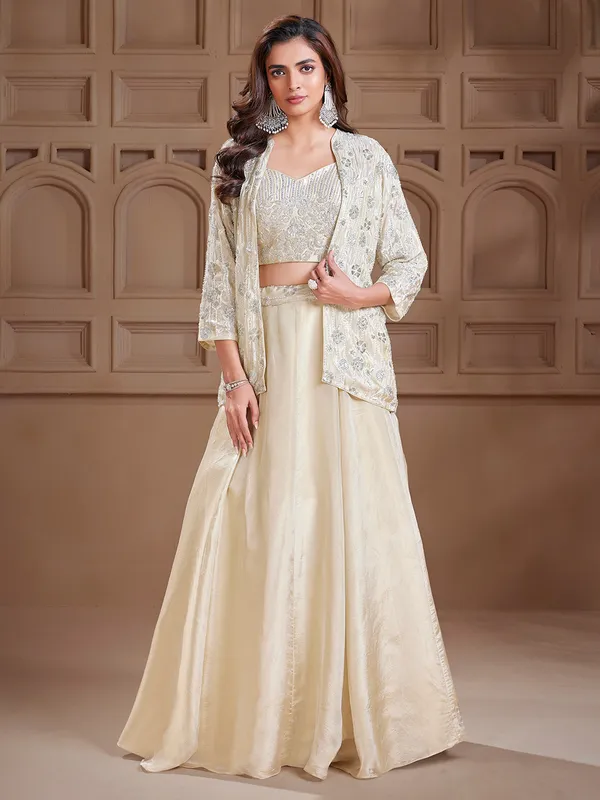 Dazzling cream silk jacket style lehenga choli