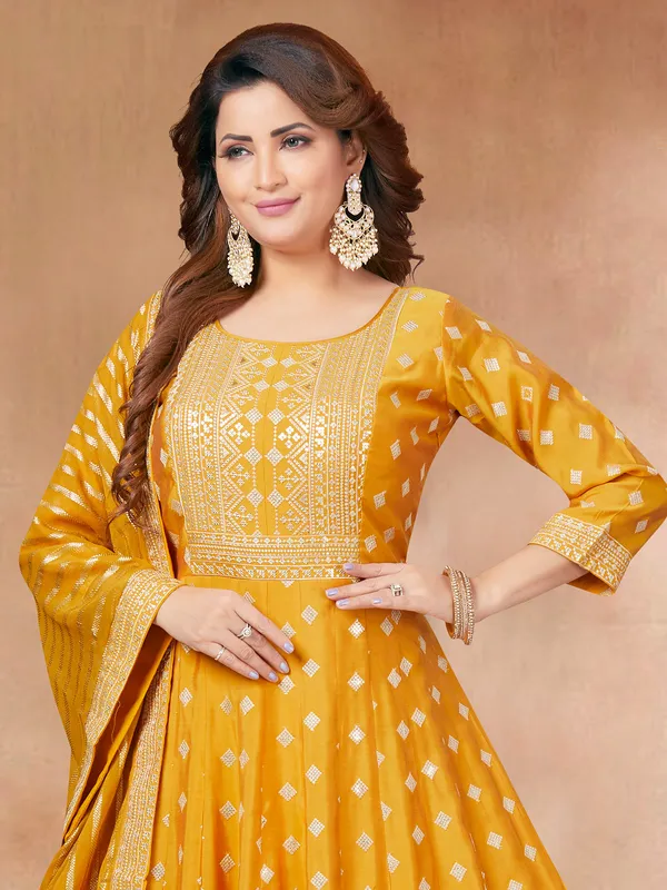 Dazzling yellow silk anarkali suit