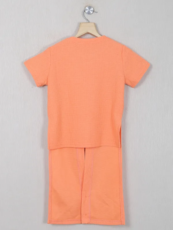 Deal orange color knitted plain top for girls