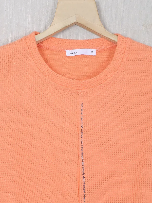 Deal orange color knitted plain top for girls