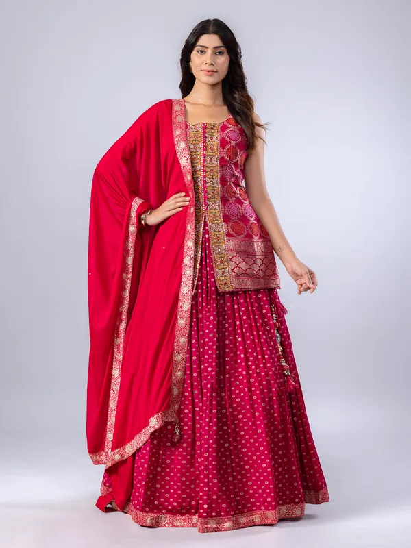 Deep pink zari worked silk lehenga suit