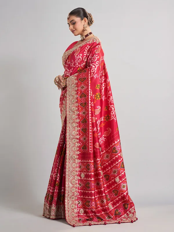 Deep rani pink patola silk saree for bridal festivities
