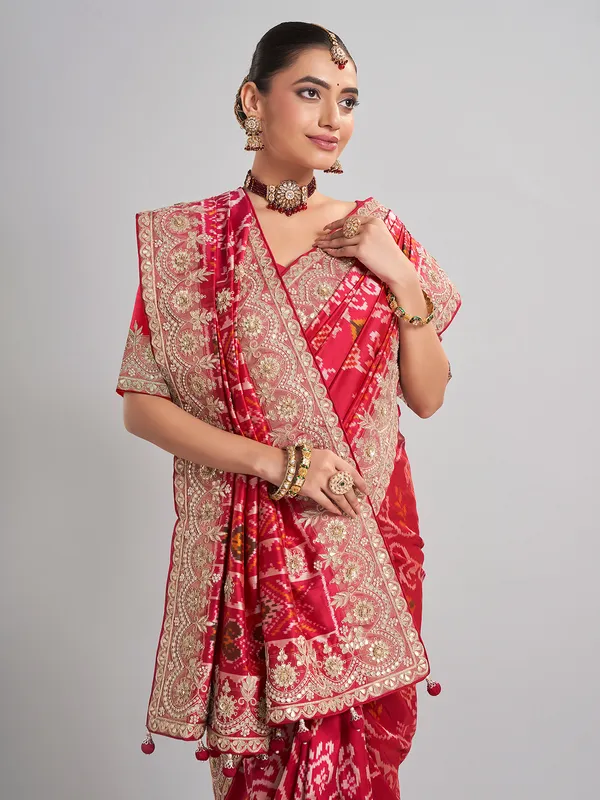 Deep rani pink patola silk saree for bridal festivities