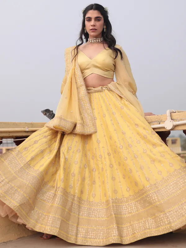 Delightful yellow raw silk lehenga choli