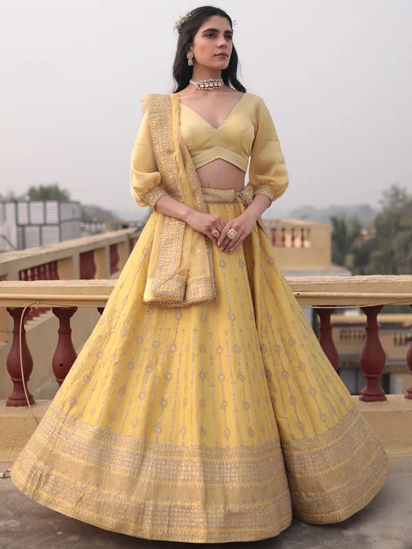 Delightful yellow raw silk lehenga choli