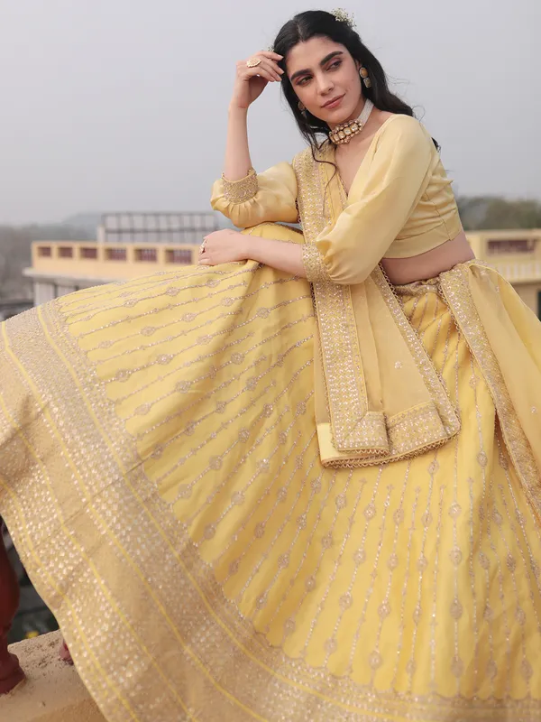Delightful yellow raw silk lehenga choli