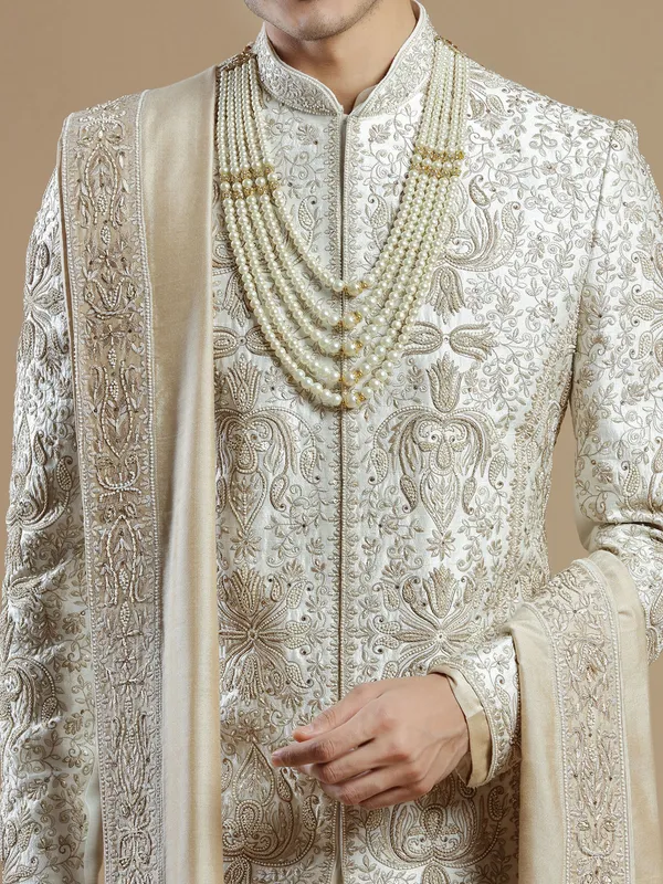 Designer cream color raw silk fabric sherwani