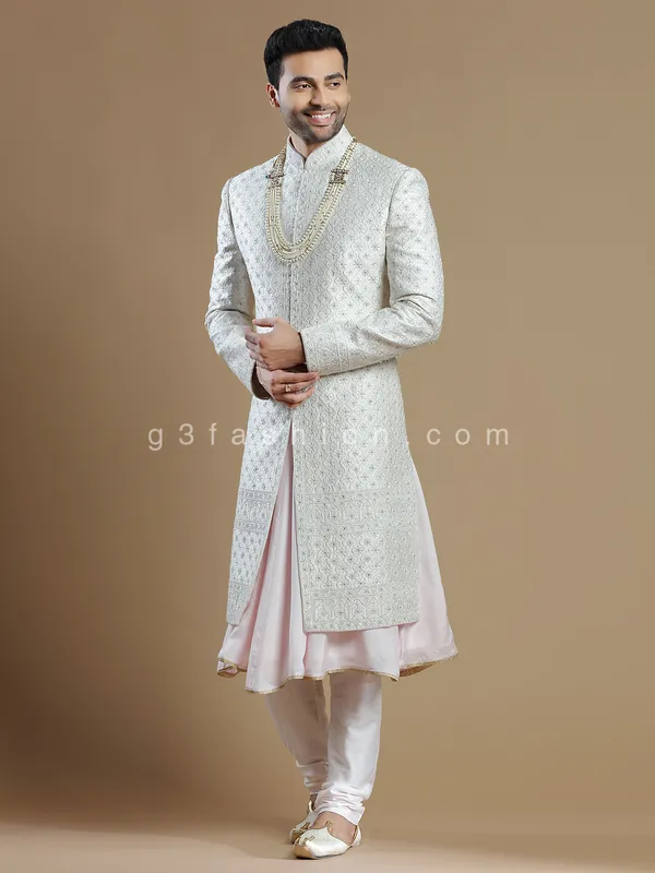 Designer off white color raw silk fabric sherwani