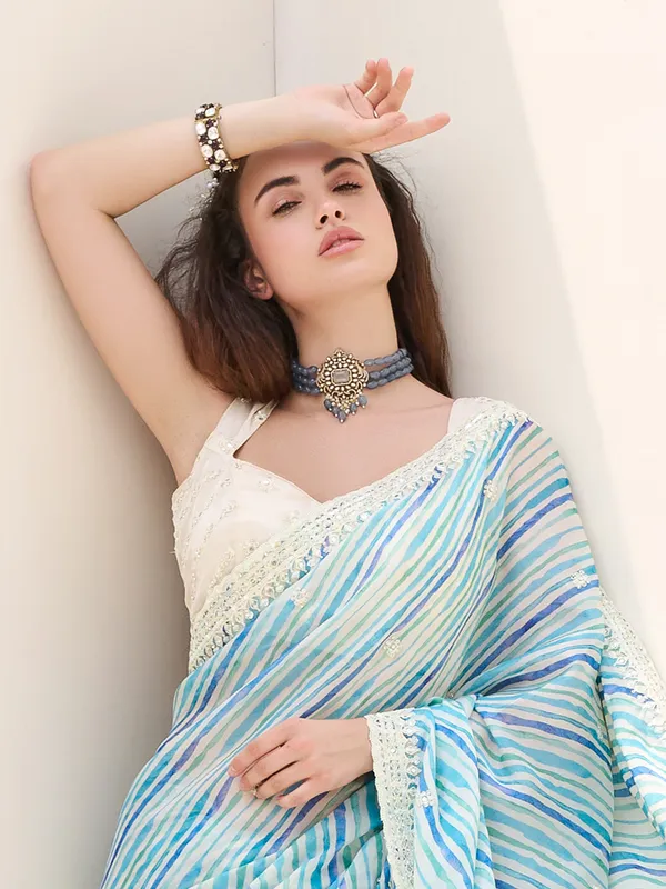 Designerd blue printed tissue silk saree
