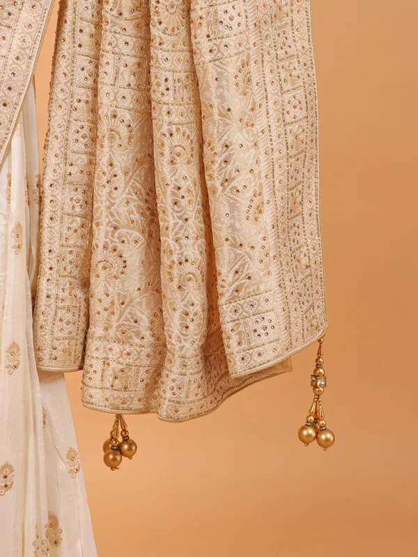 Dola silk wedding wear saree in cream