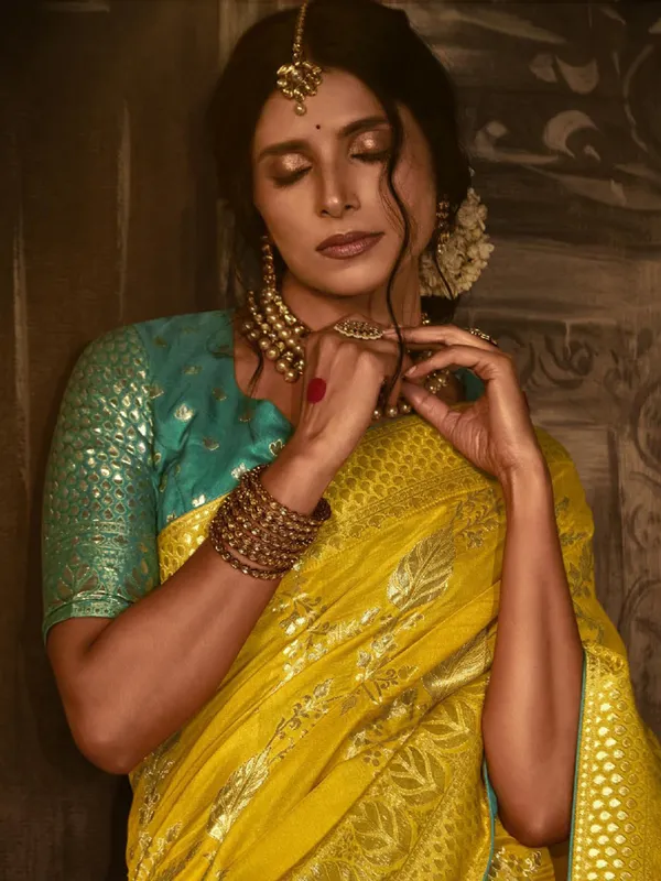 Dola silk yellow zari weaving saree