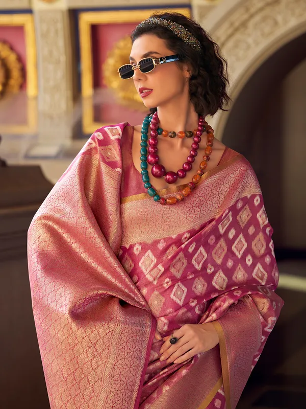 Dull magenta zari worked saree in tissue silk