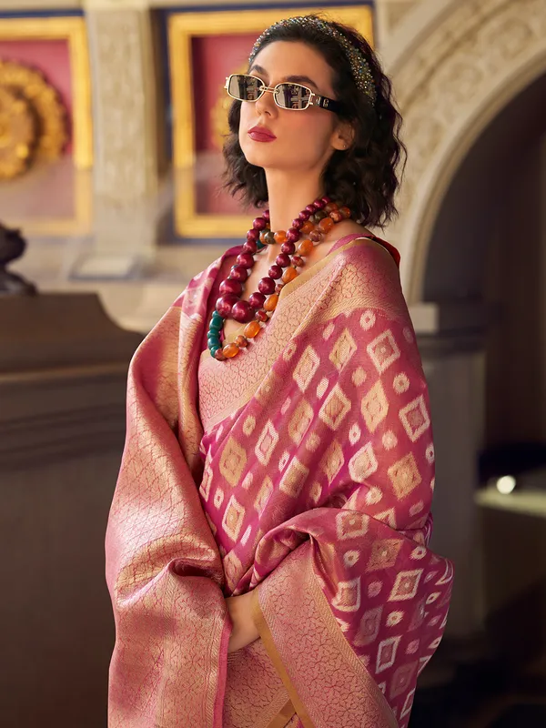 Dull magenta zari worked saree in tissue silk