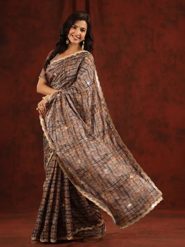 Dusty peach muslin silk printed saree