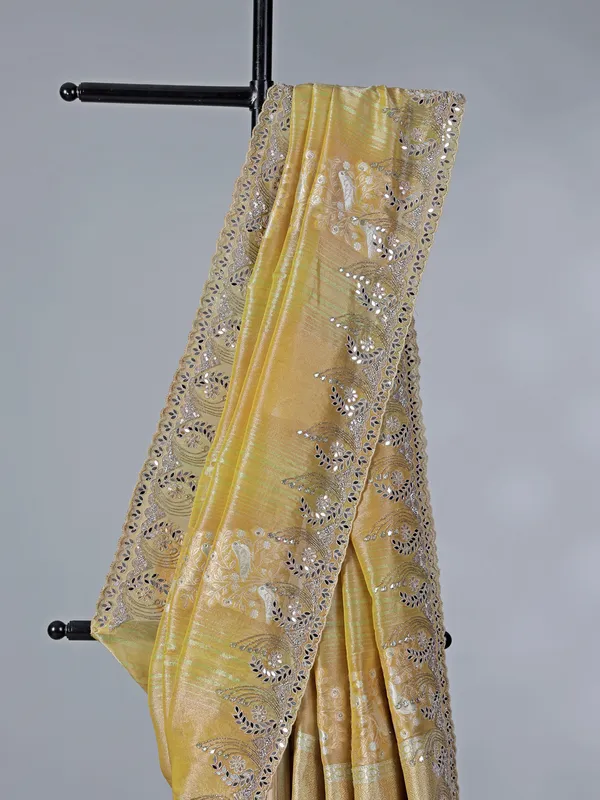 Dusty yellow dola tissue silk saree with zardosi work