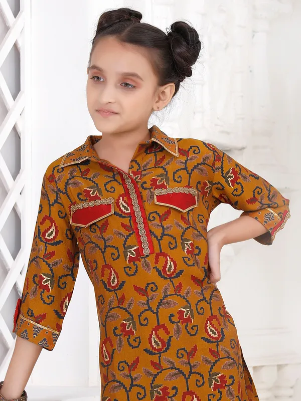 Dusty yellow printed salwar suit in cotton for girls