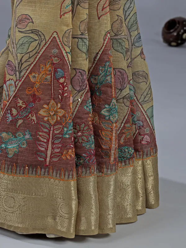 Dusty yellow printed saree with zari weaving