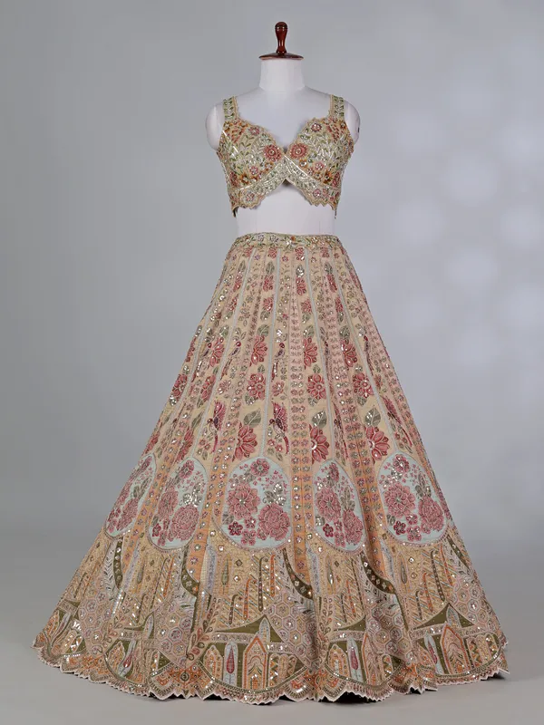 Dusty yellow silk embroidered lehenga choli with diamonds