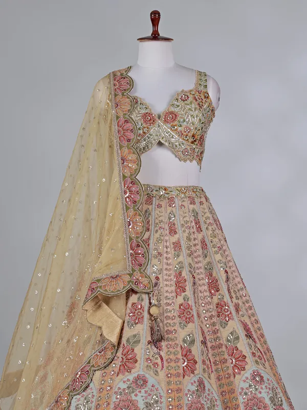Dusty yellow silk embroidered lehenga choli with diamonds