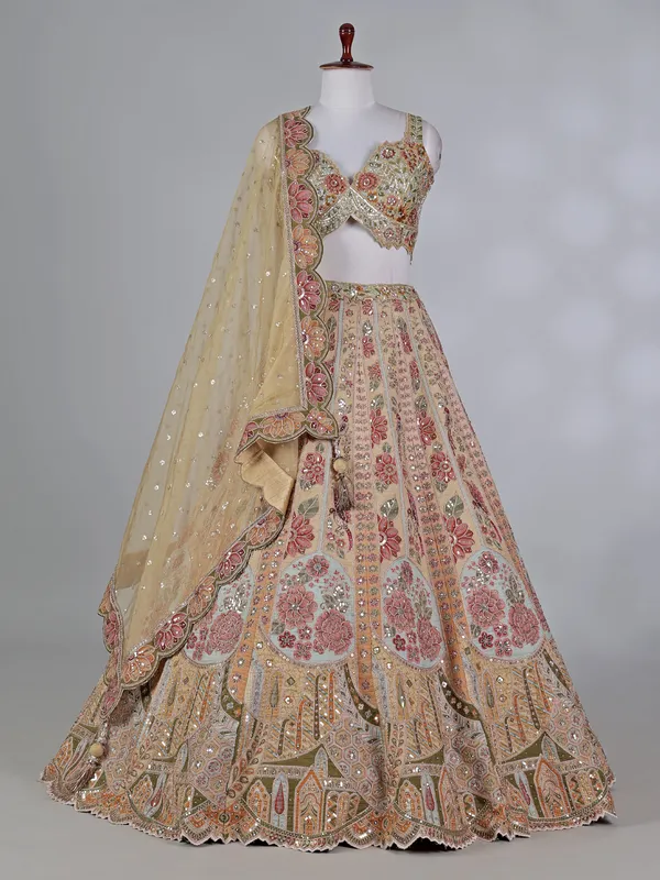 Dusty yellow silk embroidered lehenga choli with diamonds