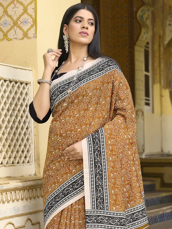 Earthy orange printed bhagalpuri silk saree