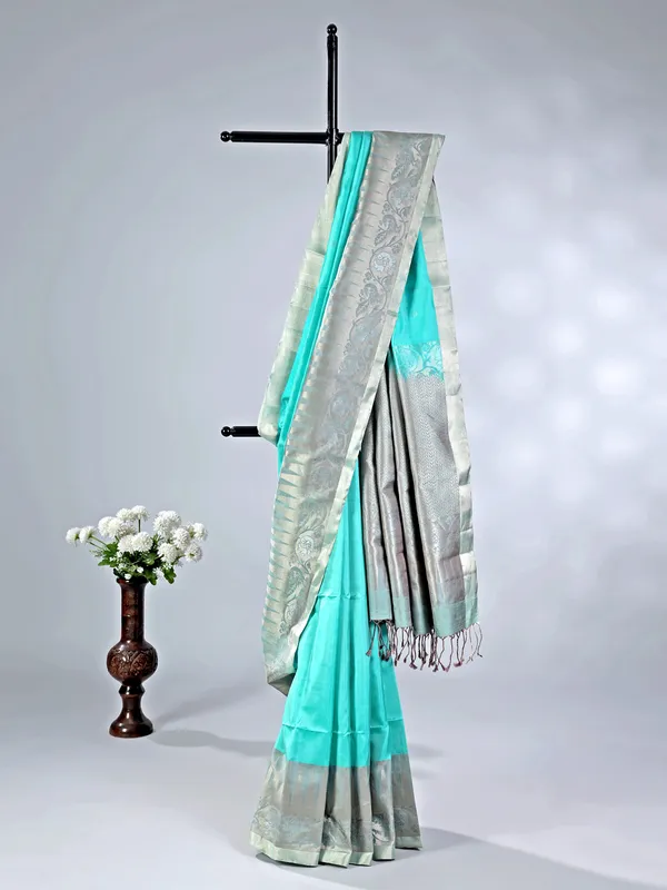 Elegant aqua silk saree with traditional zari detailing