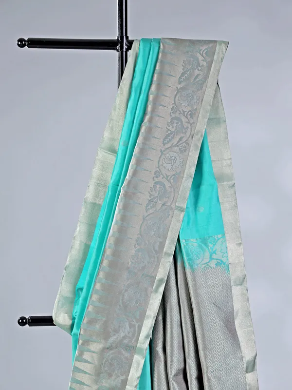 Elegant aqua silk saree with traditional zari detailing