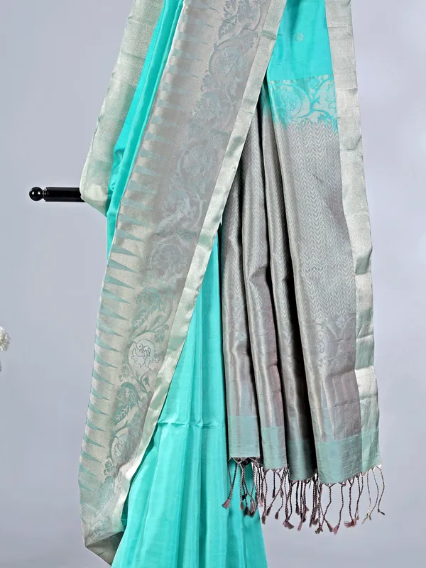 Elegant aqua silk saree with traditional zari detailing