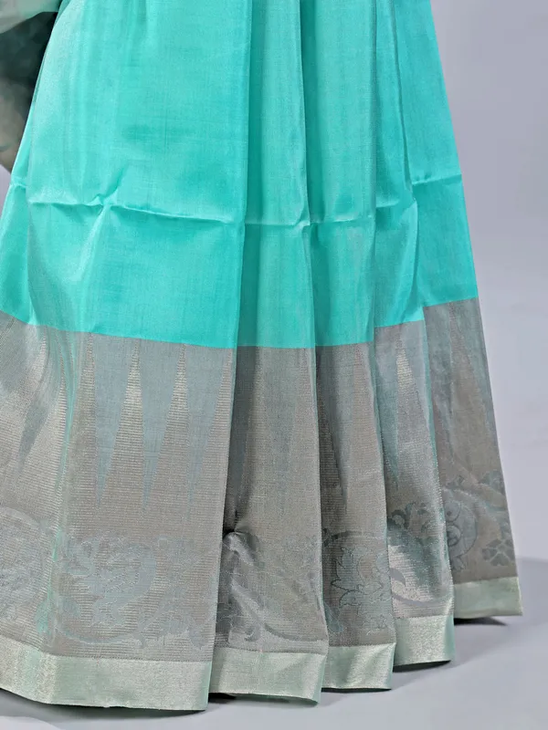 Elegant aqua silk saree with traditional zari detailing
