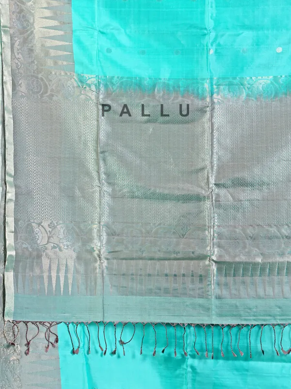 Elegant aqua silk saree with traditional zari detailing