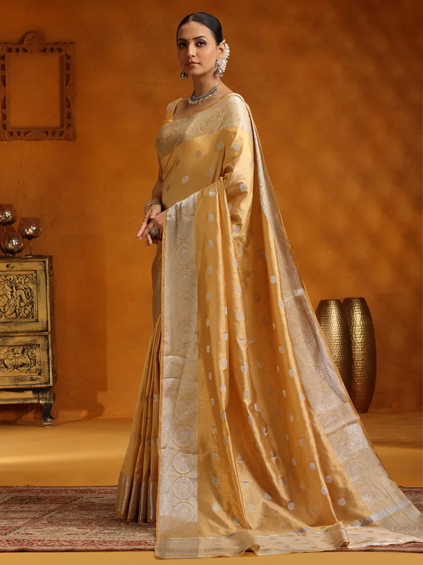 Elegant beige silk saree with zari weaving