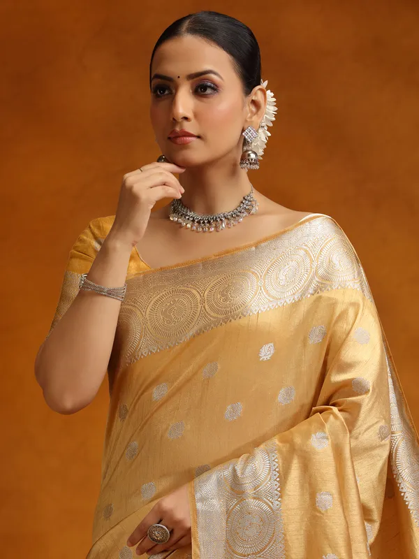 Elegant beige silk saree with zari weaving