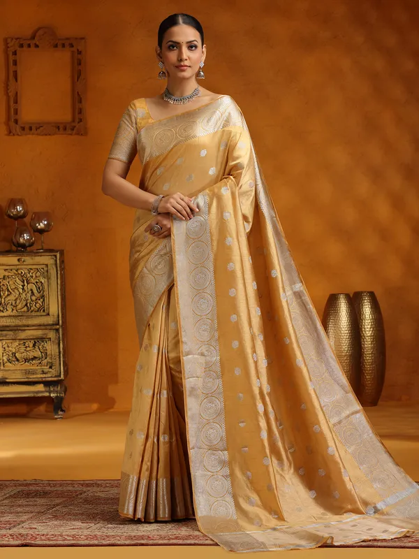 Elegant beige silk saree with zari weaving