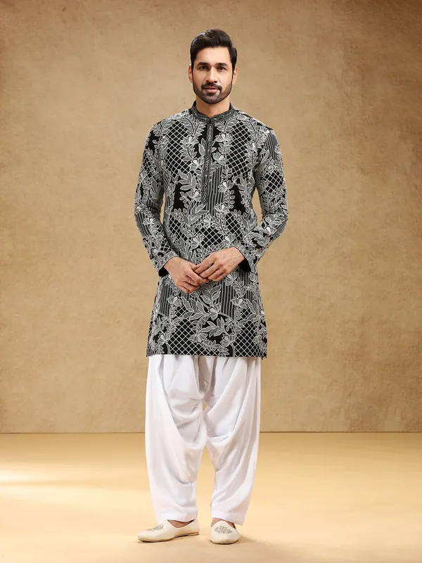 Elegant black georgette festive kurta suit with salwar