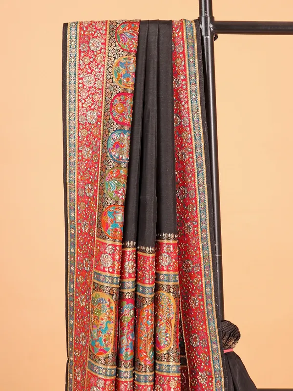 Elegant black silk saree with unstitched blouse