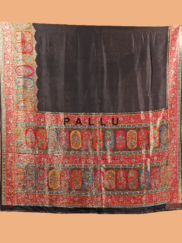 Elegant black silk saree with unstitched blouse
