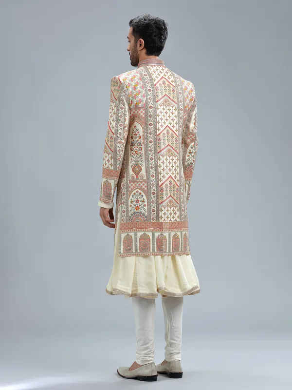 Elegant cream raw silk groom sherwani