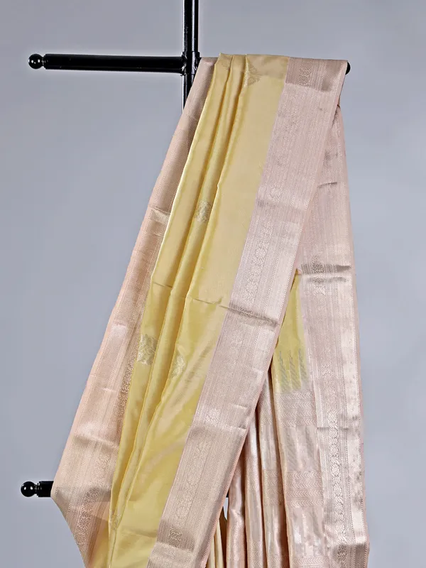 Elegant cream silk saree with subtle zari weave