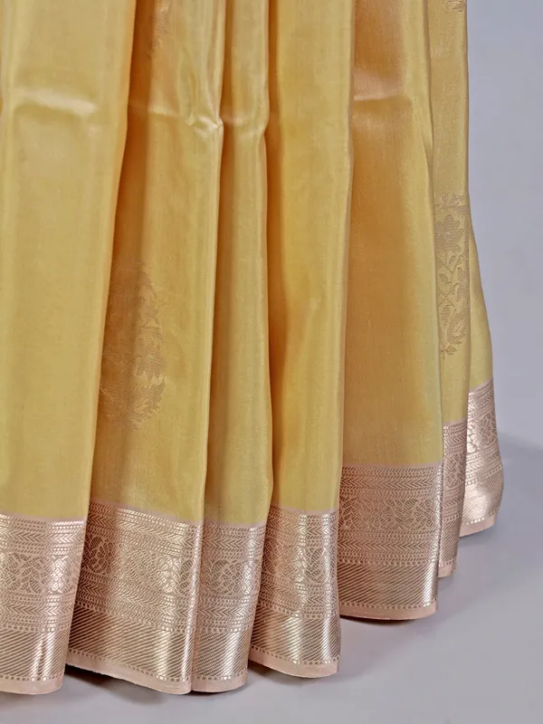 Elegant cream silk saree with subtle zari weave