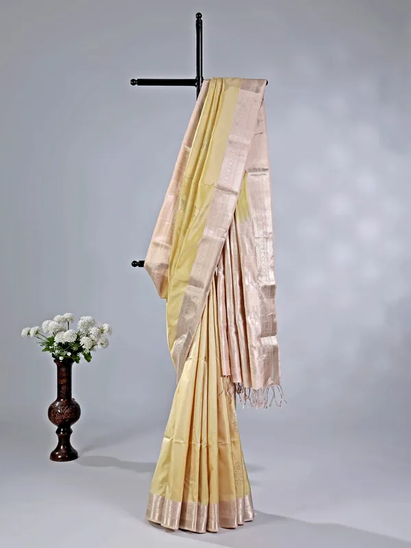 Elegant cream silk saree with subtle zari weave