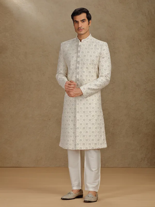 Elegant cream silk sherwani for grand weddings