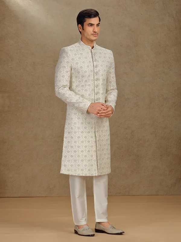 Elegant cream silk sherwani for grand weddings